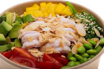 Salad with shrimp, pineapple, tomato, beans and avocado