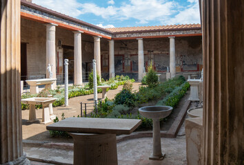 The House of the Vettii is a Roman domus that was buried during the eruption of Mount Vesuvius in 79 AD and later uncovered during the archaeological excavations of ancient Pompeii.