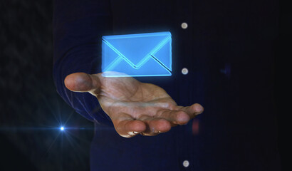 Envelope email and mail message symbol over hand