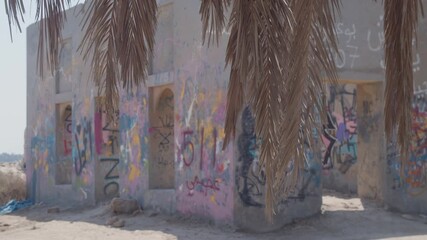 Condemned building remains with graffiti