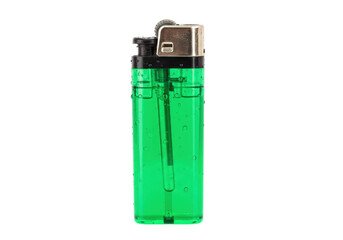Isolated green translucent lighter with gold-colored cap, for igniting cigarettes or fuel