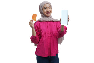 Smiling Muslim Woman Holding Credit Card and Smartphone with Blank Screen for Mobile Banking Concept