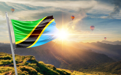 Tanzania flag waving in beautiful scenery. Tanzania national flag for independence day.