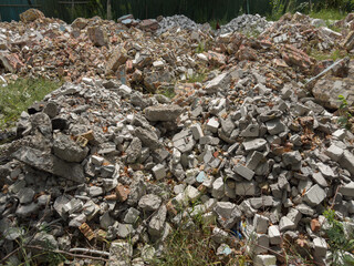 Heaps of construction debris, as remains of destroyed building structures