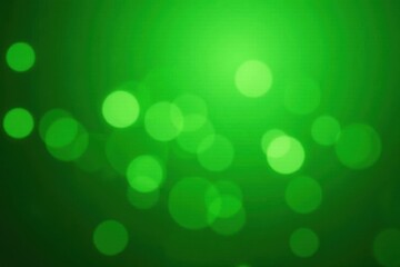 Abstract green bokeh background, twinkling lights , design, radiance, vibrant