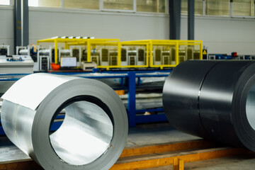 Industrial plant for the production of sheet metal in a steel mill