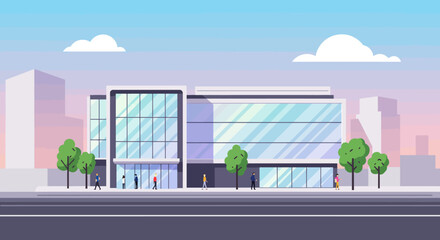 Obraz premium Modern urban building with glass facade in a cityscape setting