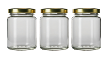 Three clear glass jars with gold lids in a straight row
