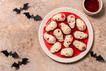 lazy dumplings vareniki with raspberry sauce for Halloween
