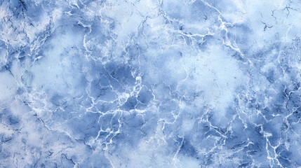 Obraz premium Textured blue surface with white cracks resembling aged stone or marble
