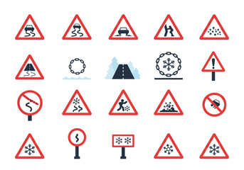 Array of road signs warning for slippery icy conditions and snowrelated hazards