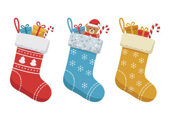 Three Christmas stockings are filled with gifts and candy canes