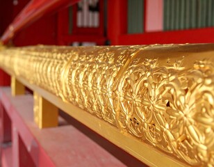 Ornate gold trim on a temple railing