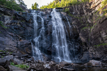 Skjervsfossen, a prominent waterfall located in Voss Municipality, Norway