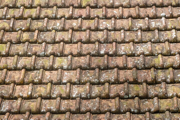Background pattern and texture of traditional clay tile roof. Typical Indonesian roof tiles. For graphic design, 3D rendering and banners
