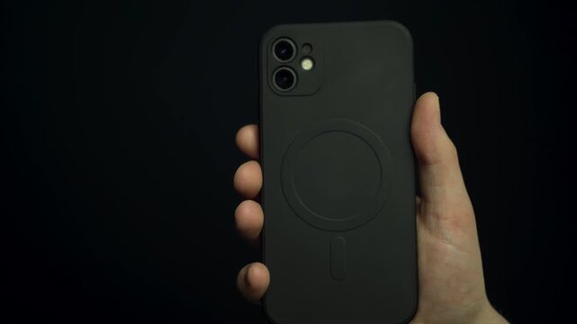 hand taking phone off wireless charger first