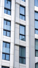 Modern apartment building exterior with many windows