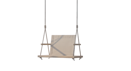 Empty, light swing suspended against a black background