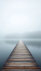 A Wooden Pier Extends into the Mist-Covered Water, Offering a Pathway to Quiet Contemplation and Reflection