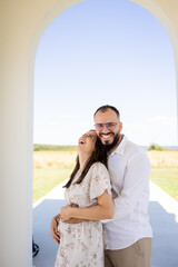 Naklejka premium Pregnant couple sharing happy moments expecting baby