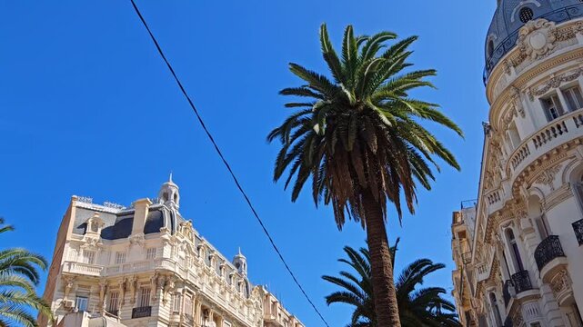 This ancient landmark building features stunning European architecture under a clear sky, representing an iconic travel destination in oran, algeria