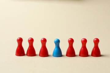 A row of colored chips on a pastel background