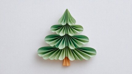 Decorative paper tree in green tones with layered design  