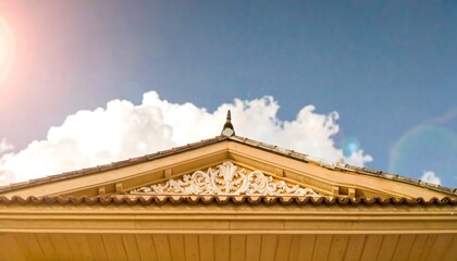 Ornate roof detail against a vibrant sky