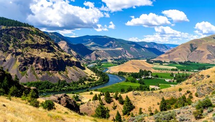 Fototapeta premium Mountain valley with river and farmland