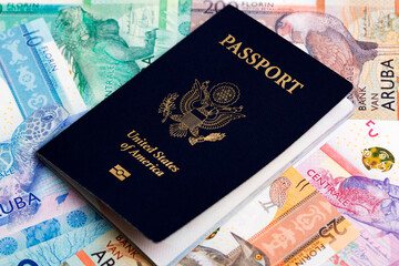 American passport on Aruban money