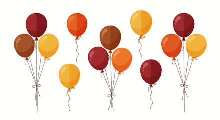 A festive collection of party balloons in warm autumn colors of red orange yellow and brown arranged in bunches and singles. © ahmad