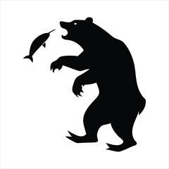 Black silhouette of a bear catching a fish in its mouth