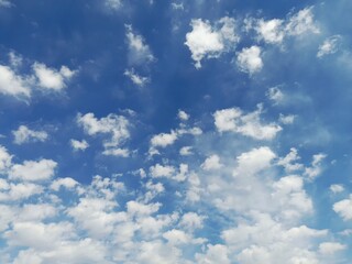 Cumulus clouds are usually fluffy, white, and have clear outlines, like piles of cotton.