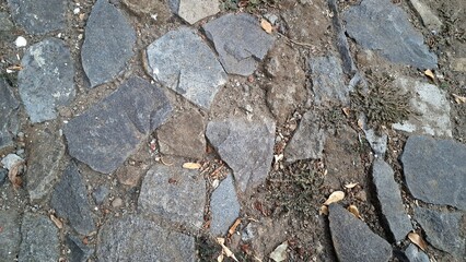 Rough Stone Ground Texture with Cobblestone Arrangement and Natural Rock Surface for Design Background