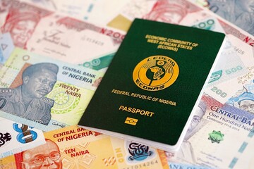 Nigerian naira currency money bills and passport. The concept of travel and vacation