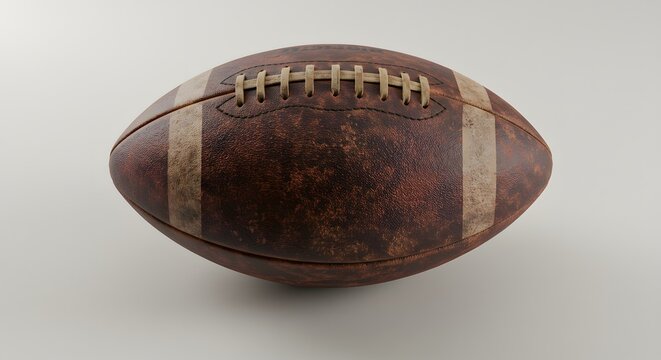 Top view of vintage leather football on neutral surface
