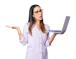 Young worried frustrated business woman wearing eyeglasses holding a laptop computer standing over transparent background.