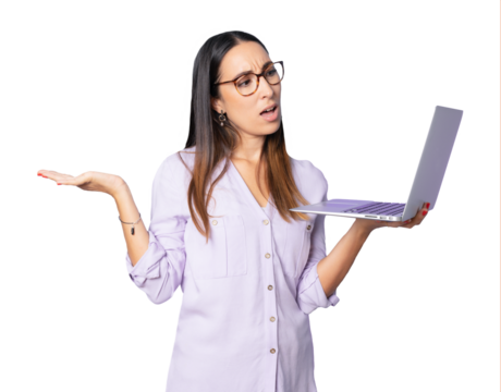 Young worried frustrated business woman wearing eyeglasses holding a laptop computer standing over transparent background.