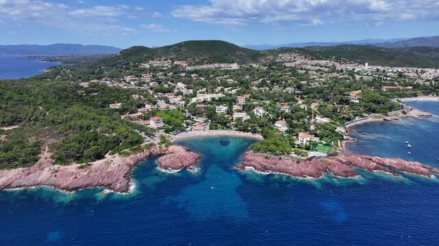 4k aerial video footage, flying along coastline of Agay Bay, French Riviera (C&ocirc;te d'Azur) near Cap Dramont, a nature preserve, Cap Esterel and Beaches, "Plage de Camp Long" and "Plage d'Agay"