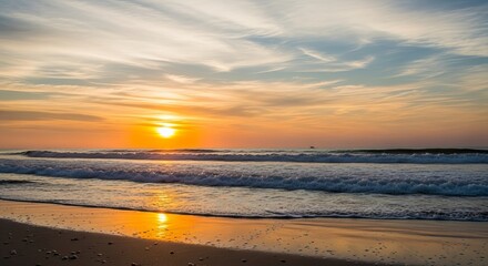 Fototapeta premium Golden hour magic at the coastline, where the setting sun paints the sky with vibrant hues reflecting on the tranquil ocean waves and sandy shore
