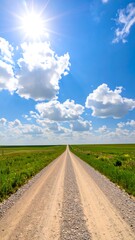 Open road through grassy plains under a vibrant sky