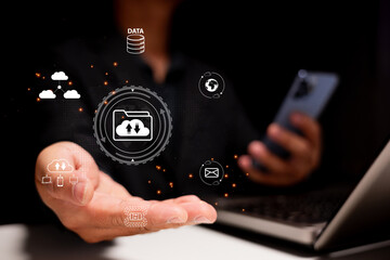 A hand reaching out with digital icons representing data transfer, cloud storage, and communication, illustrating modern technology and connectivity.
