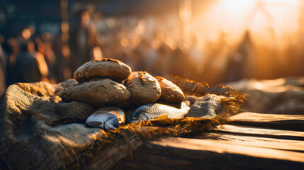 The biblical miracle of the five loaves and two fish, Jesus Christ feeding the multitude, a rustic still life of bread and fish in golden light, a story of faith, hope and God's divine provision.


