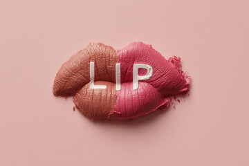 Lip concept on pink background features two lipstick shades forming lips with white letters "LIP" across, creating a stylish visual.