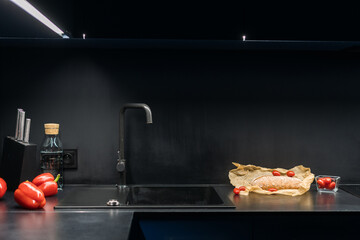 Blue kitchen cabinet enhances modern apartment's stylish interior design