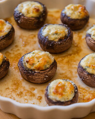 baked champignon mushrooms stuffed with herb cream cheese and topped with parmesan. Perfect for illustrating cozy fall appetizers, party snacks