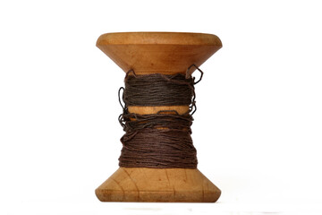 Rustic wooden thread spool vintage tailoring object