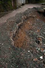 Landslide on mountain road after heavy rain disaster