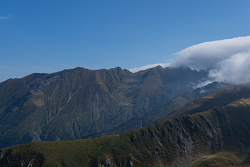 fagaras mountains ridge high mountain peaks on sunny day