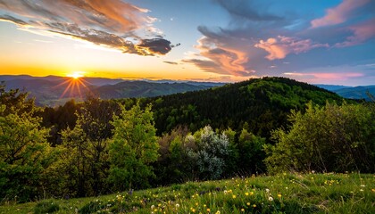 Panoramic sunset view over a mountain range